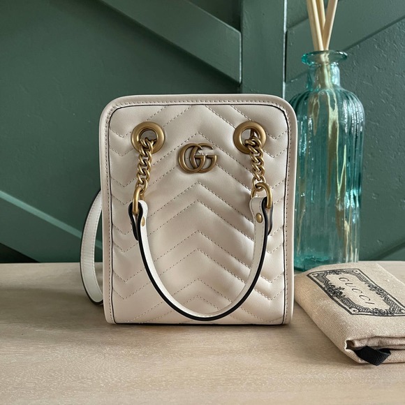 Gucci Handbags - NEW Gucci Marmont Mini Vertical Tote Crossbody Bag White Gold HW